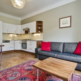 Obývací pokoj s kuchyňským koutem Ateliér bytový architekt